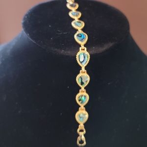 Abalone shell bracelet, gold tone.